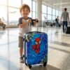 Superhero Cartoon Printed ABS Kids Trolley Blue Kid Using